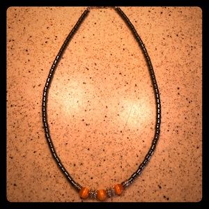Hematite necklace with orange stone accents